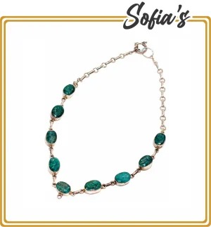 Necklace with nine natural emerald stones